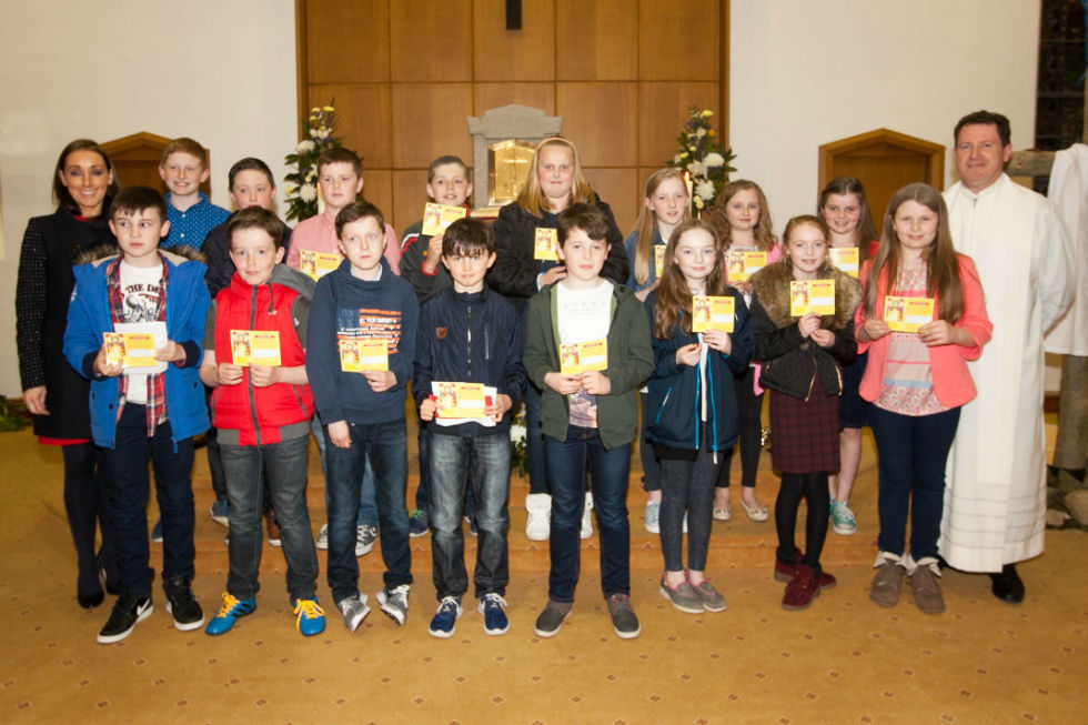 P7 Children receive pioneer pins.